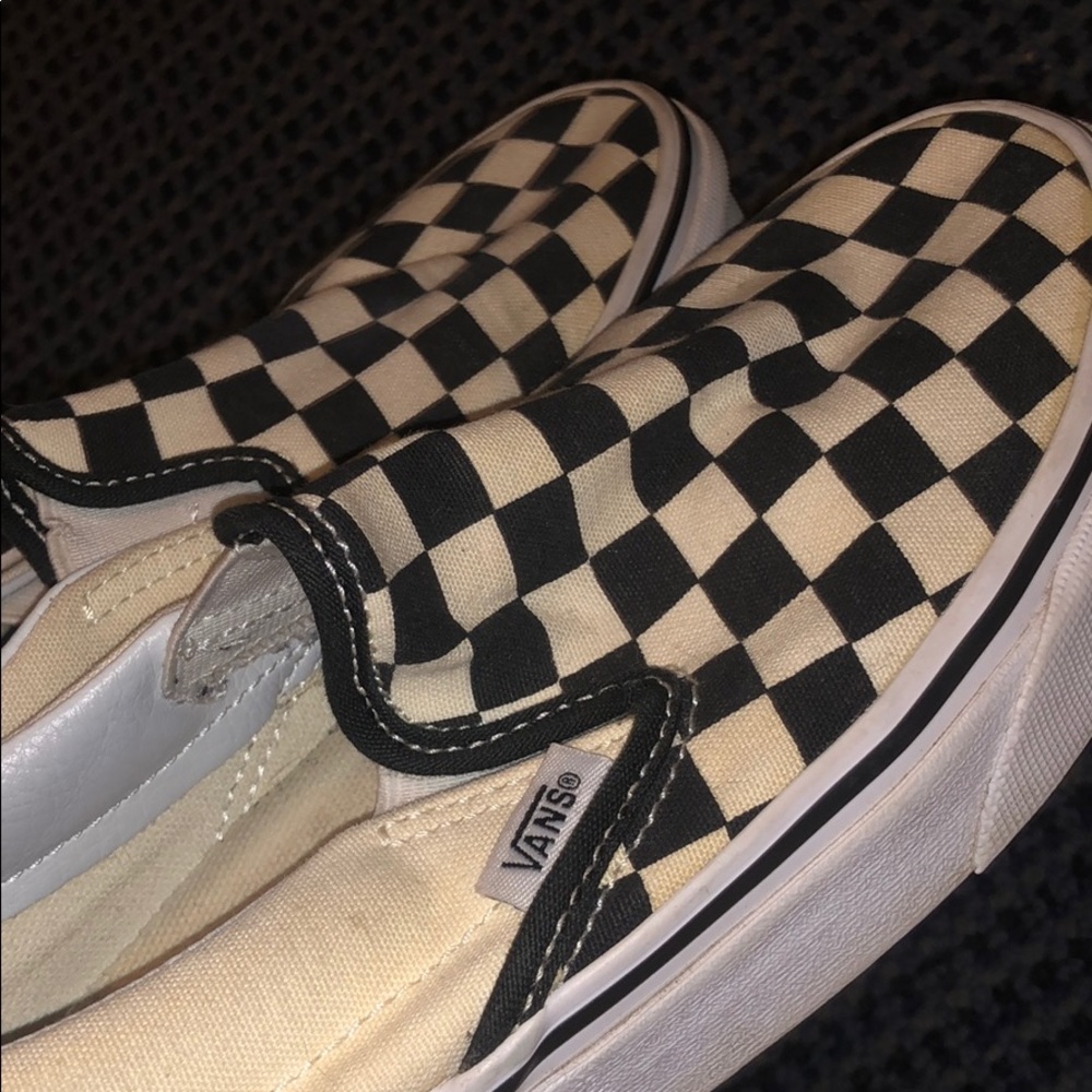 Checkered slip-on vans